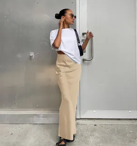 Jupe longue satinée champagne style français à taille haute et drapé élégant pour femme