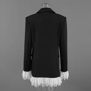 Rear view of this elegant black blazer showing exquisite white lace trim on hem and cuffs