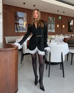 Sophisticated black blazer with white lace hem and cuffs for elegant women fashion