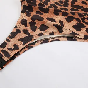 Close-up of leopard print knit bodysuit showing high-quality fabric and stitching detail