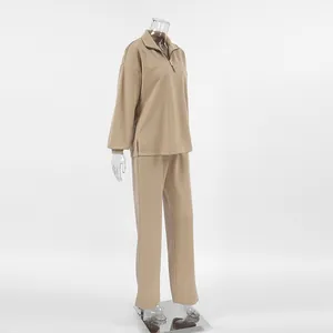 Side view of khaki small stand-up collar loose sweatshirt and trousers set for women