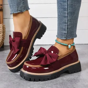 Elegant burgundy patent leather bow loafers with chunky platform lug sole for women