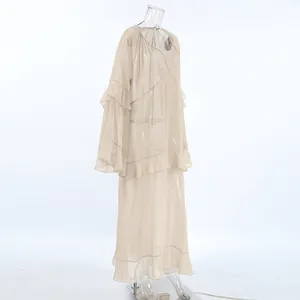 Side view of elegant khaki sheer chiffon maxi dress with tiered ruffle batwing sleeves