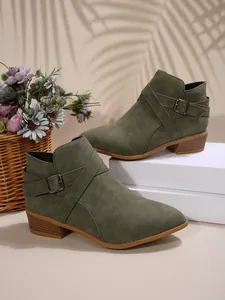 Olive green pointed toe Chelsea boots with cross straps and block mid-heel for women