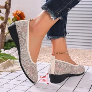 Detailed view showing the 3.5cm wedge heel and breathable lace mesh of these women's flats
