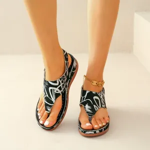 Womens ethnic style wedge flip-flop sandals featuring artistic black and white patterns