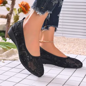 Detailed view of breathable black lace mesh flat shoes with sequins for women