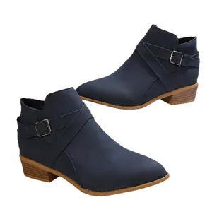 Elegant navy blue pointed-toe Chelsea boots with cross straps and block heels for women