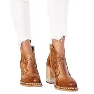 Women's brown embroidered leather ankle boots with crystal block heel and rivet details
