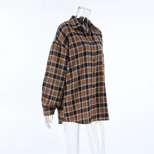 Side view of oversized coffee plaid button-down blouse on transparent mannequin