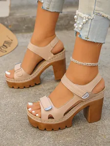 Stylish beige platform high-heeled sandals with adjustable velcro straps and chunky heel