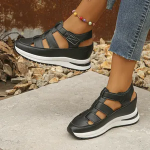 Side view of black women's platform wedge sandals with breathable hollow-out design