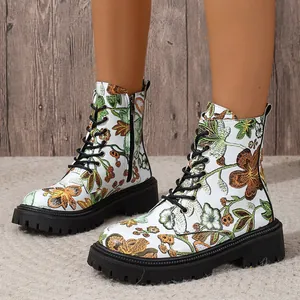 Stylish white floral print lace-up combat boots with chunky black soles for women