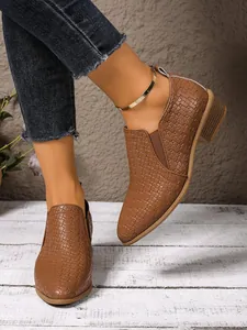 Brown woven texture pointed-toe ankle boots with metallic cuff and chunky heel detail