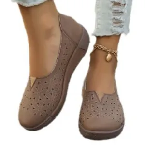 Women's casual hollow-out flat shoes with laser-cut flower pattern and round toe