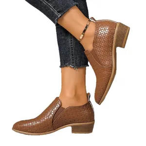 Women's brown pointed-toe ankle boots with woven texture and chunky heel
