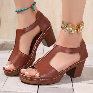 Close-up detail of brown peep-toe platform sandals with chunky heels and elegant stitching