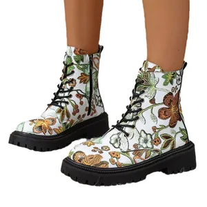 Vintage floral print women's combat boots with lace-up closure and black lug sole