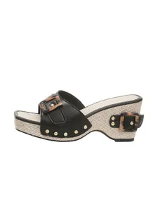 Women's black leather wedge sandal with decorative leopard buckle and woven straw sole