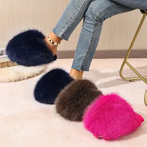 Detailed macro view showing the soft texture of colorful fluffy faux fur slippers for women
