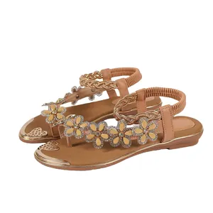Bohemian women's flat sandals with rhinestone flower charms and braided elastic straps
