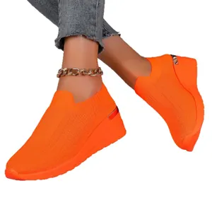 Breathable orange knit wedge sneakers with platform sole for women's casual wear