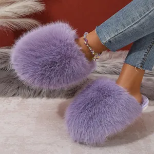 Cozy purple fluffy faux fur slippers for women presented in a stylish home setting
