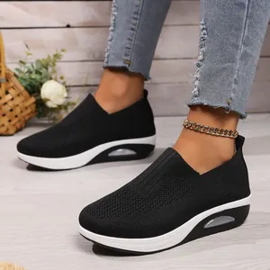 Comfortable black knit rocker sneakers with breathable mesh and air cushion sole.