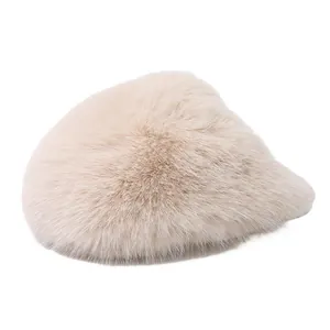 Detailed view of beige fluffy faux fur slippers showing the soft plush texture for winter