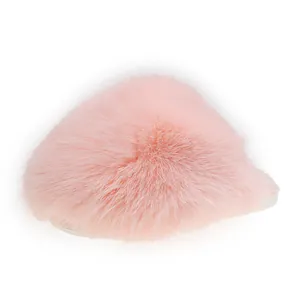 Close-up of soft pink fluffy faux fur slipper with warm closed-toe design
