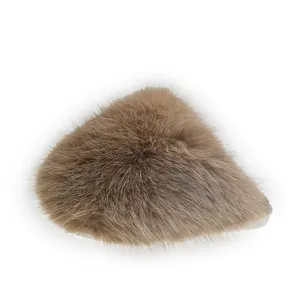 Close-up of fluffy faux fur slipper in khaki, showing soft texture and warm winter design.
