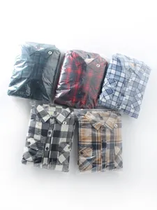 Set of 5 men's fleece-lined plaid shirts in assorted colors, neatly packaged in bags