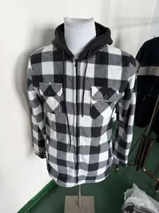 Close-up of men's black and white checkered fleece-lined hooded jacket on mannequin