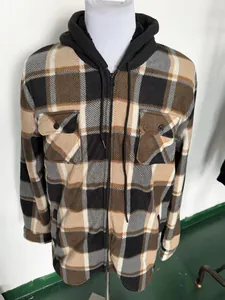 Close-up detail of a men's thickened plaid hooded jacket with zipper and chest pockets