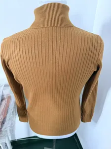 Detailed back view showing the vertical ribbed texture of a caramel men's turtleneck sweater