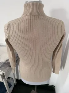Back view detail of a beige ribbed turtleneck knit sweater for men on a white mannequin