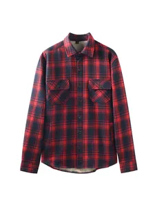 Macro view of men's red plaid shirt with warm fleece lining and button details.