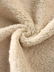 Detailed macro shot showing soft and warm beige sherpa fleece lining for men's winter shirt