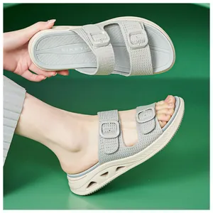 Breathable hollow-out platform slides for women with soft non-slip sole in a light grey finish
