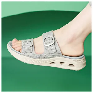 Close-up of grey breathable sports sandal with soft hollow platform sole for women