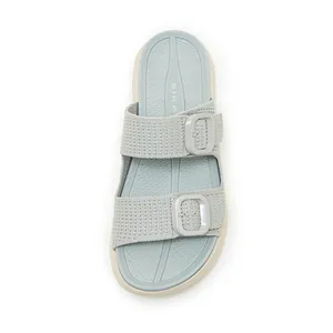 Top-down detail of light blue platform sandal with dual adjustable buckle straps
