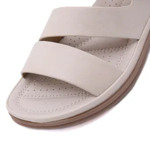 Macro detail of comfortable beige women's wedge sandal with breathable insole