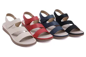 Group of comfortable women's casual sandals in beige, red, navy and black colors