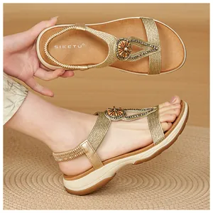 Detail of Bohemian women's sandals with rhinestone embellishments and elastic back strap