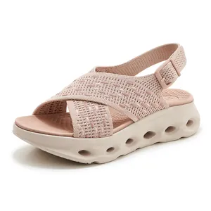 Stylish pink knit platform sandals for women featuring adjustable velcro heel straps.
