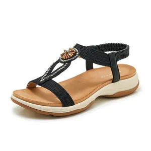 Elegant bohemian black sandals for women featuring rhinestone T-straps and soft non-slip soles