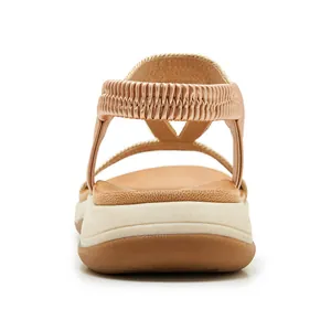 Rear view of women's rose gold bohemian sandals with soft sole and elastic strap