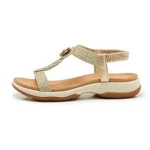 Elegant gold bohemian sandals with rhinestones and comfortable soft wedge sole