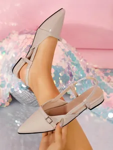 Elegant beige patent leather pointed-toe slingback flat sandals with thin ankle strap