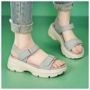 Detail of women's platform sandals with soft anti-slip sole and adjustable velcro straps.